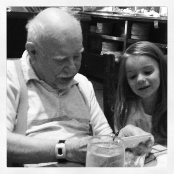 Bill Danner learning how to use the IPhone from his great granddaughter ;-)