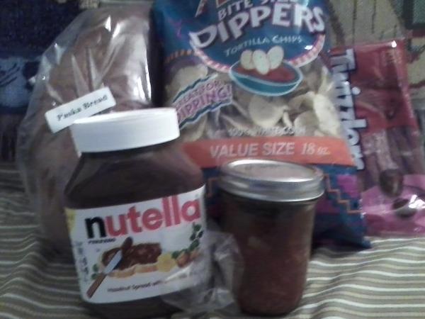 Somehow my family always knows what I need. #nutella #paskabread #twizzlers