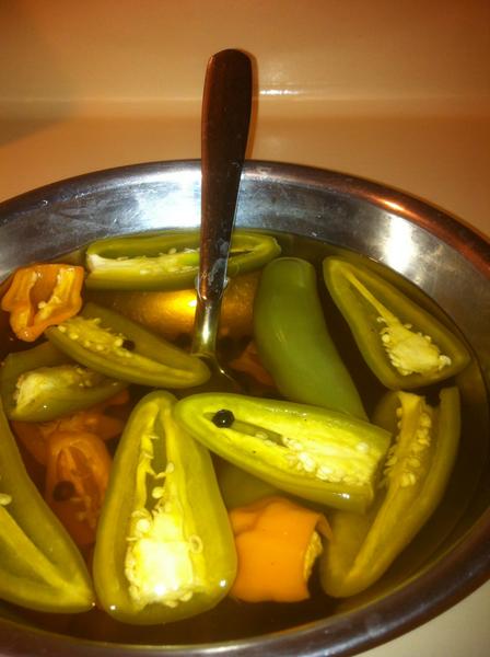 TexasSnapshots's tweet photo. I thought it would be smart to learn how to pickle peppers during the week that I'm moving back to Austin. http://t.co/MlbDaXeD