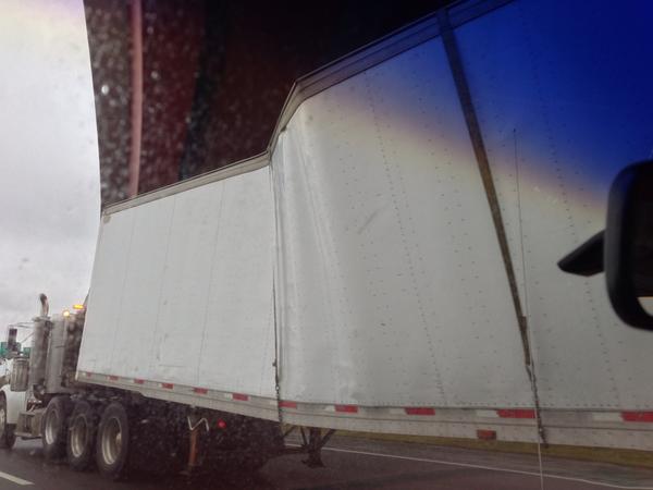 Skyyr's tweet photo. With all of the new fuel-efficient trailer designs,this has to win the award in the "most un-aerodynamic" category. http://t.co/plAOX0C1