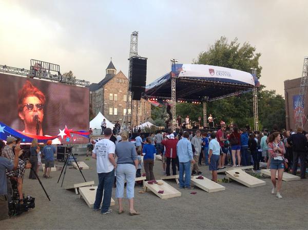 DenverChannel's tweet photo. Workers had to remove banners from the stage as The Lumineers play The wind is pretty strong #DebateFest #DenverDebate http://t.co/b8yYM4E6