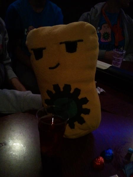 The plushie had fun yesterday, by the way (team shirts in the background).