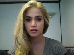 I am checking out the internet while Emmett is playing Wii against Edward. Yes, it's really me. Rosalie Lillian Hale