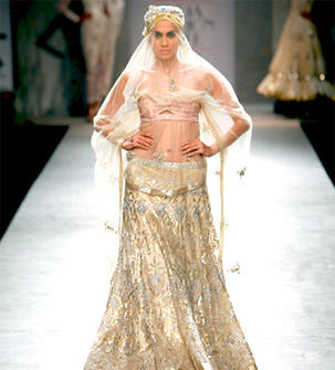 VOGUEIndia's tweet photo. More pics of @suneetvarma 's frothy #WIFW concoctions on #VOGUEIndia http://t.co/qOkgXmqK http://t.co/9c5LOaga