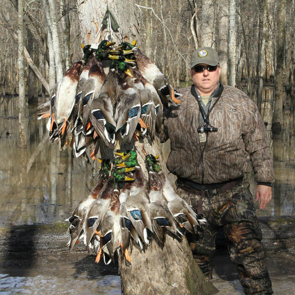 duckslayerz24's tweet photo. My Dad after a hunt in Arkansas Last year. First time in Flooded timber. http://t.co/GkJ094Dv