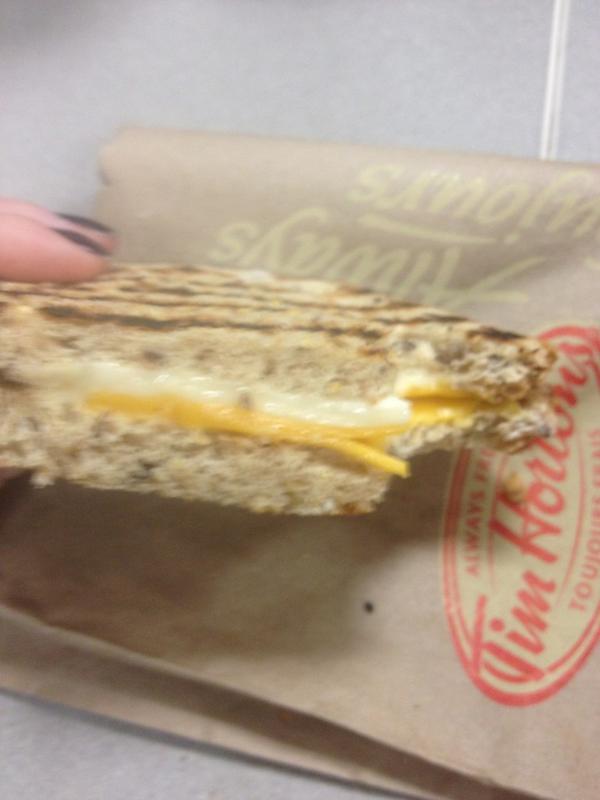 alysiarissling's tweet image. Someone ought to tell Tim Hortons your supposed to melt the cheese in a grilled cheese #notpleased