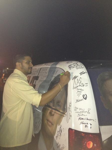 WesternGJVan's tweet photo. Emmy award winning filmmaker, @AmardeepKaleka signing the #TeamFreedom van @JustCauseEntertainment!#GoGaryJohnson http://t.co/bOtR8EO4