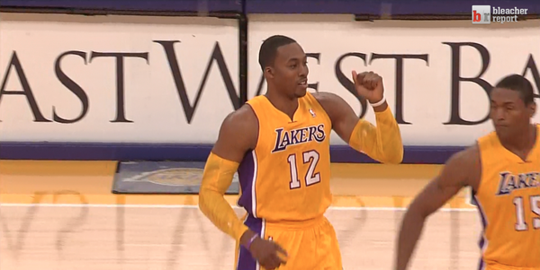 LeoraGoldfarb's tweet image. he looks good in purp &amp;amp; yellow. #DH12LA RT RT @BleacherReport Dwight Howard makes his debut for the Lakers