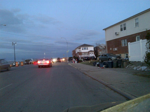 JoshMargolin's tweet image. Family of 8 bundled up, waiting on Bch Channel Dr for their lift out of the #Rockaways. #SandyAftermath