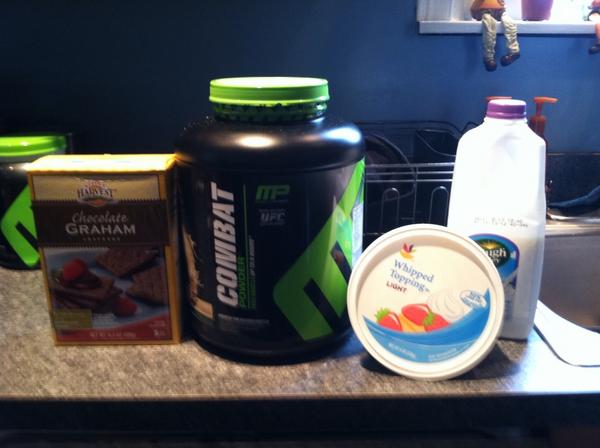 1cup of lf milk; 11/4 scoop of cookies & creme whey; 6 icy bed; 2 choco graham crackers; 1/4 cup lowfat creme