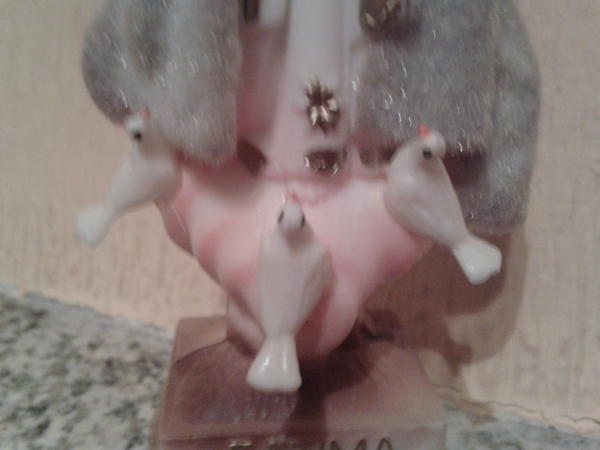 Gasape09's tweet image. #Preguntamolona ¿Qué ave se encuentra a los pies de la virgen de Fátima?