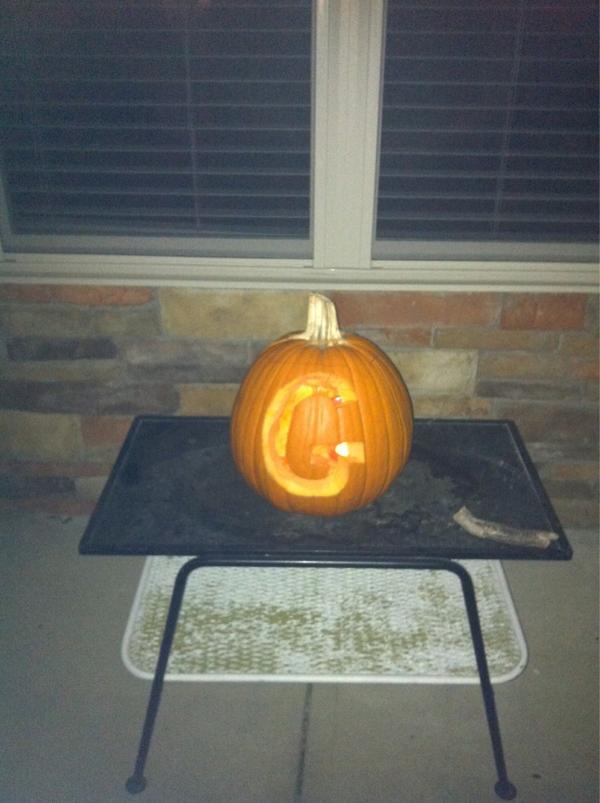 Here's one pumpkin at night- I forgot/was too lazy to turn the flash on my phone off!