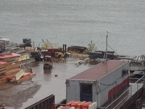 jsmckinney's tweet photo. Already flooding outside the @AsheAvenue office and the storm hasn't started yet #sandy http://t.co/ifOdVzLh