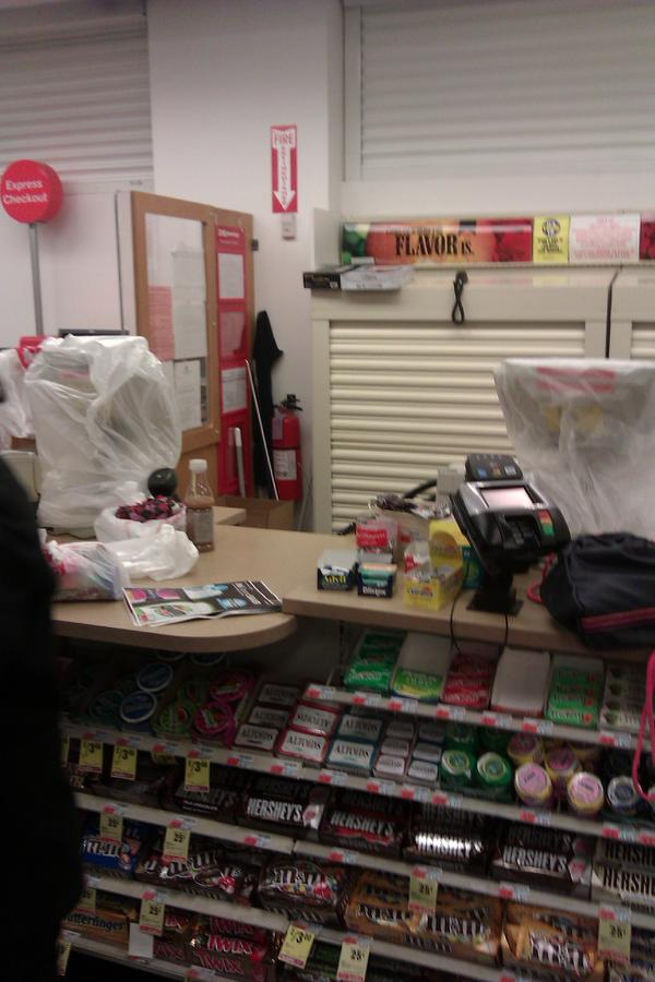 lizzyx90's tweet image. Look at how they covered the register to protect it from #sandy #cvsproblems