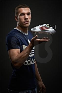 45EachWay's tweet photo. Podolski's boots which he created himself. He will wear these in Saturday's game vs. Man United http://t.co/qPTAkLK1