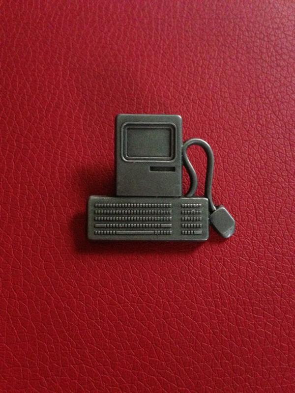 rckprentice's tweet photo. Coworker brought me an original Macintosh pin yesterday. Found it laying around his house. #applefanboy http://t.co/V2KPjF6s