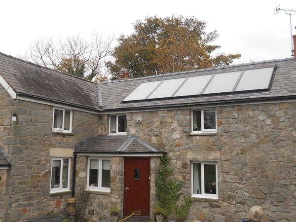 Picture of our latest In-roof flat plate Solar Thermal installation to help heat swimming pool complex.