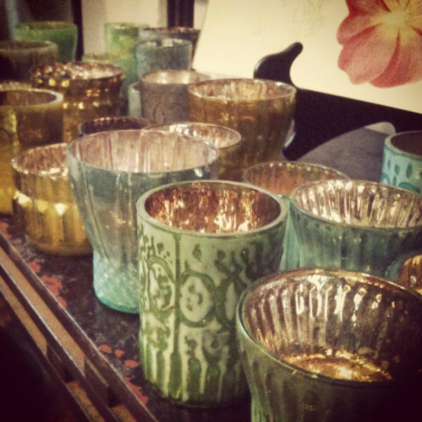 Check out our Lilla Votives that are a colored glass finish with mercury silver inside to create a beautiful glow!