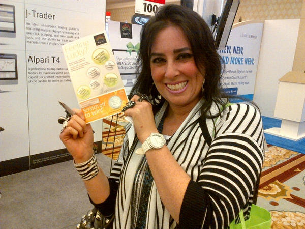 AlpariUS's tweet photo. Congrats Amber, winner of our scratch-off 10% deposit bonus, get paid to trade!  #TradersExpo http://t.co/GYIa0md7 http://t.co/CksW52hT