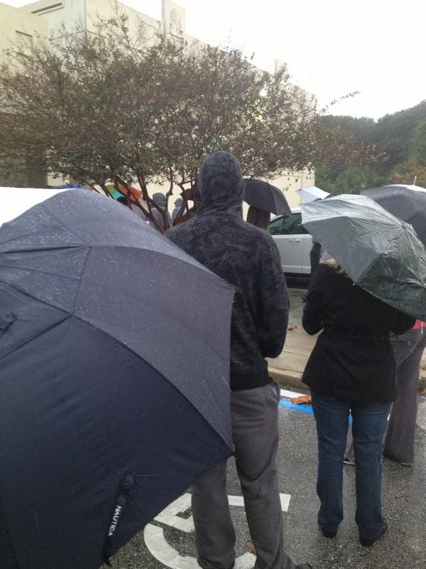 susancree's tweet image. 7am, standing ioutside in the rain in line  already snaking around building. #voting2012