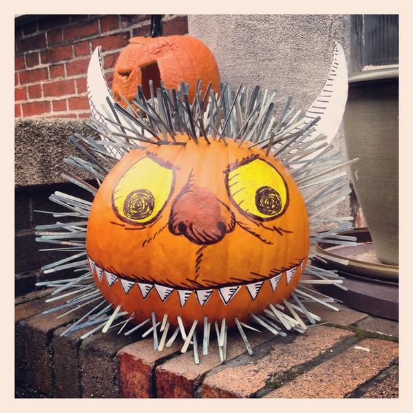 Jack-o-lantern pumpkin carved in into a book character from Where the Wild Things Are.