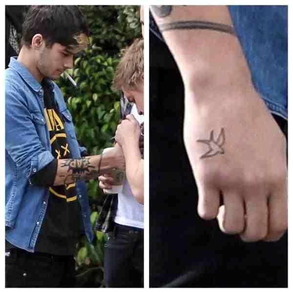 Zayn Malik Fan on X: "Zayn had his ZAP tattoo colour changed to black instead of red..and got a new hand tattoo - http://t.co/EhfMVnre" / X