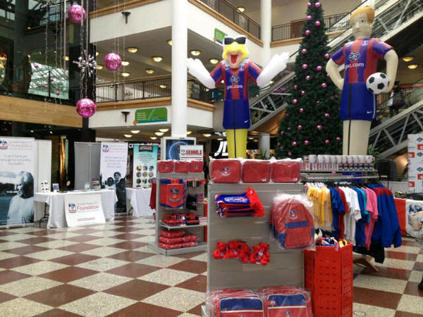 CPFC's tweet photo. The shop is set up at our Roadshow in the Whitgift Centre, Croydon - Ian Holloway and players will be there at 5pm. http://t.co/8imUjS7s
