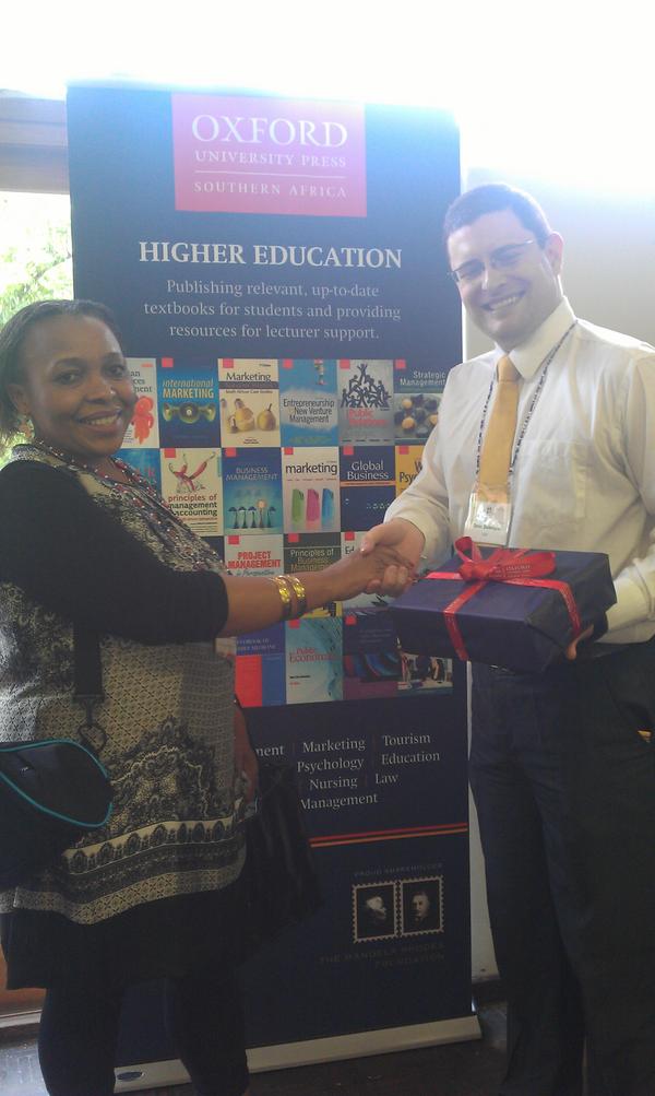 Mabokang from CUT with her lucky draw prize from Oxford University Press. #heltasa2012