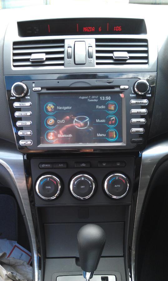 <a href="/MazdaAus/">Mazda Australia</a>. Hey look, Darryl just installed this in-dash navigation unit to this #mazda6. Looks good in the piano black!