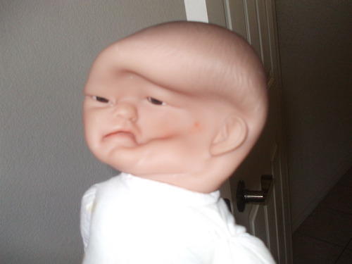 squished baby doll head
