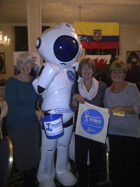OperationRobot's tweet image. Rhodri the Robot gets some cwtches at the Touching The Sun launch. Lucky Robot!!