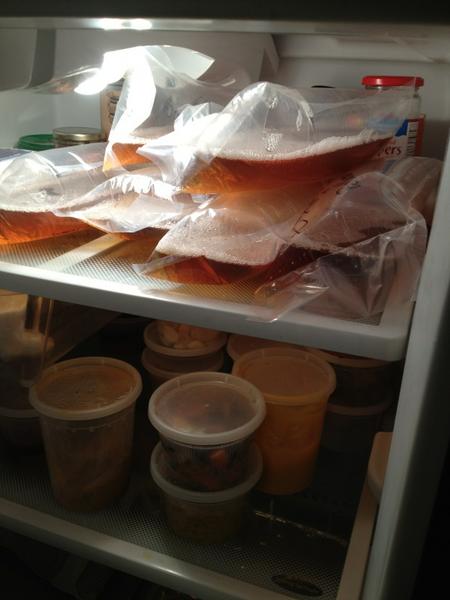 SammyRichman's tweet photo. @tpaopao back in the apt with home brew in cryovac--and I thought I already had an interesting fridge http://t.co/htMYvkmo