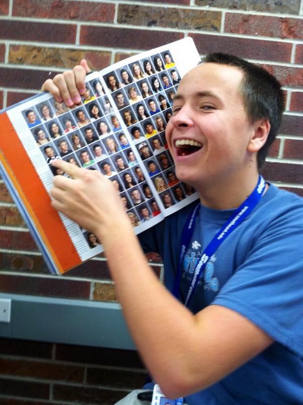bruceclaussen's tweet image. Posing with my freshmen picture in #Yearbook #SoFatThen #stillam