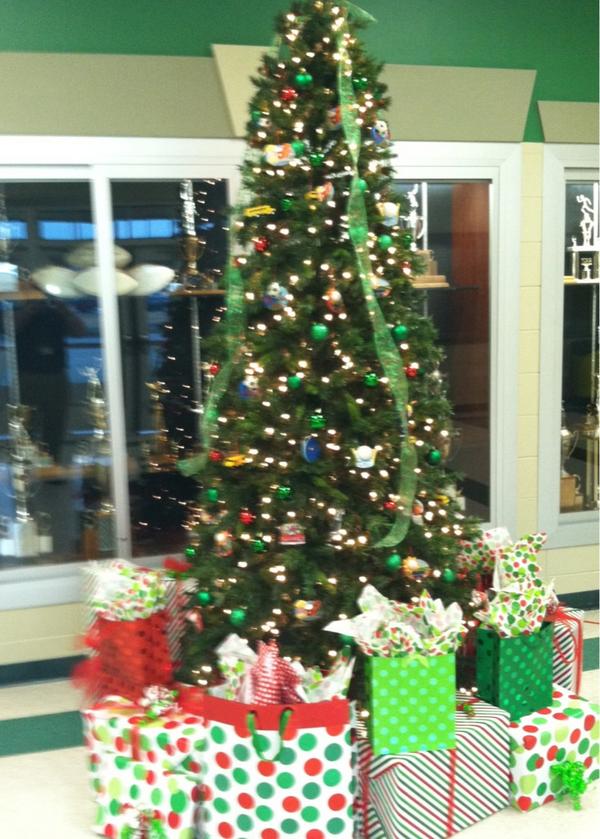 easleyhs's tweet photo. Christmas decorations are going up at EHS.  Sports theme tree in the gym lobby below. http://t.co/Ut6v90mW