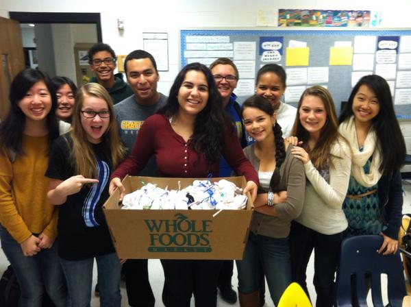 servewithflood's tweet image. Hooch flood wrapping socks with candy canes for Street Reach! #loveradically