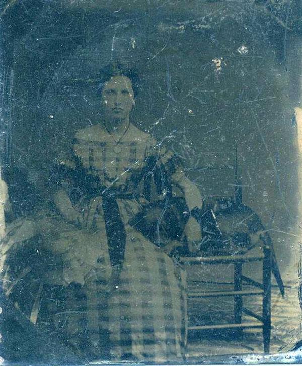 HammyDerWeiner's tweet photo. A teen girl from the 1850s with her doggy in a chair beside her http://t.co/mUE4GUKe
