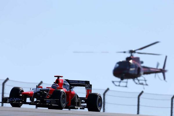 ManorRacing's tweet photo. USGP. Quite simply #Austintatious! Produced one of our favourite pics of the season too. Very 'Bond' #MF1HotShots http://t.co/sZwGmeM5