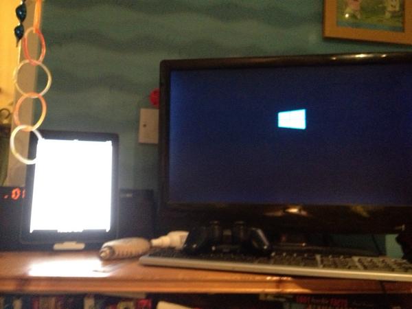 joshgreatrix's tweet image. iPad on dock next to Monitor with Windows 8 on the screen taken by iPhone :P #workedhardforthis