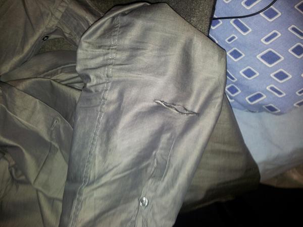 MSurradge's tweet image. Tore my favourite shirt somehow... #randomplace