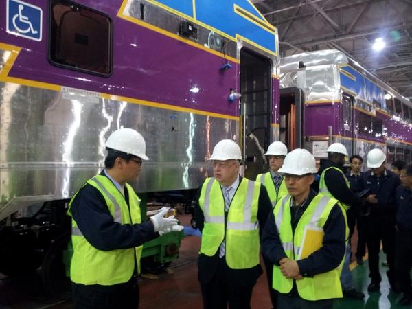 MBTA's tweet photo. #MBTA GM Davis at the Philadelphia plant where new commuter rail coaches are being built today http://t.co/uMblxWxt