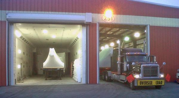 Big parts leave the shop early in the morning. Two oversize loads head to the Midwest.