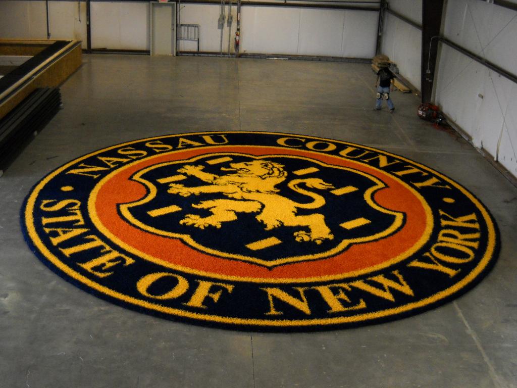 PrecisionJet's tweet photo. Amazing detail in this 30' diameter tufted logo. http://t.co/LQvkJTX