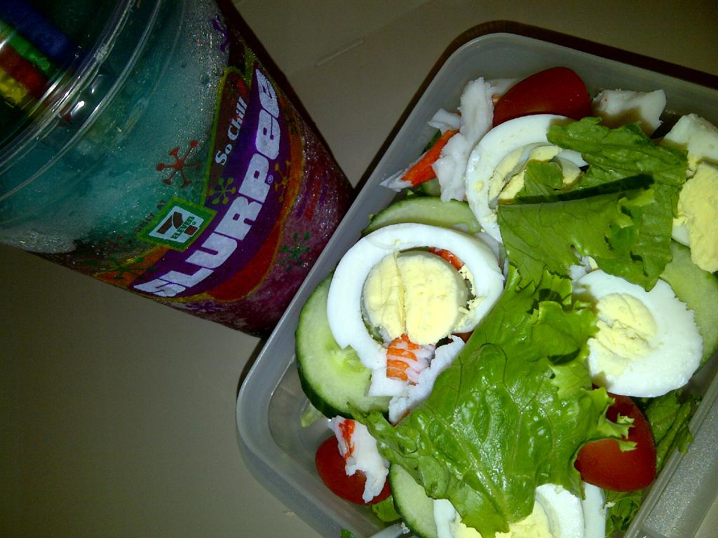 MonicaX's tweet photo. Mmm...Healthy lettuce/tomato/crab/hard boiled egg/cucumber salad - with a large Slurpee on the side pls. #slurpeeremix http://t.co/uBQgiQ3