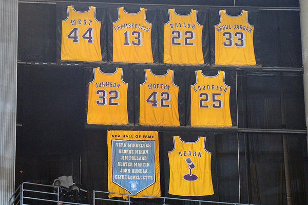 The retired jerseys of the Los Angeles Kings hang in the Staples News  Photo - Getty Images