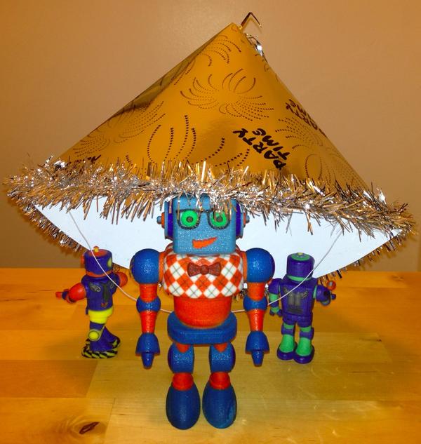 MyRobotNation's tweet image. The hat may not be robot sized, but with the help of a couple of friends, Sweetie made it work to ring in the new year!