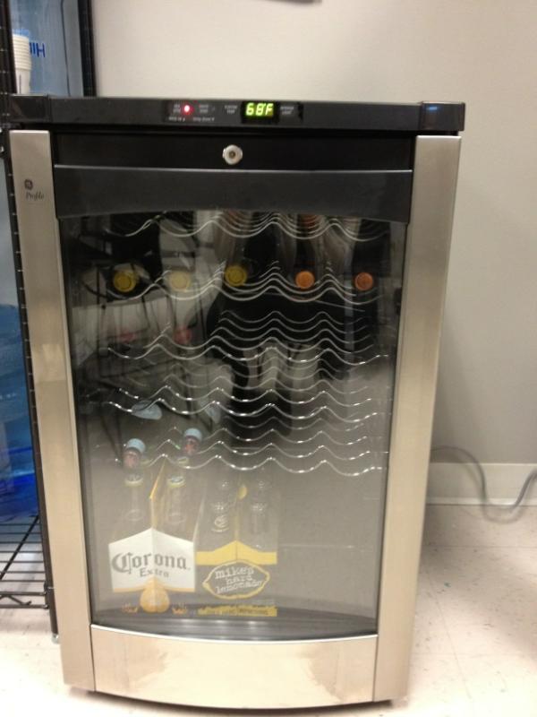 ashparo's tweet photo. Great addition to our office today. No office is complete without a wine cooler. I know @MitchellMcMitch would agree http://t.co/LtUcjl8r