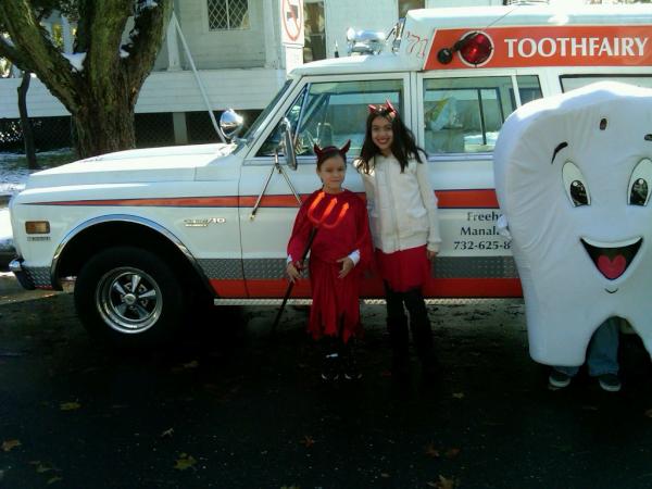 Our tooth fairy mobile, the tender tooth and Cassandra and billy all ready for the freehold parade!