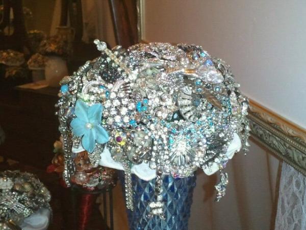 Why not have a little fun with your wedding bouquet...Champagne Taste Events can custom make a brooch boquet for you.