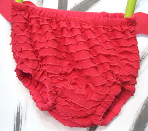Ellie Mae 102 diaper cover in hot pink knit from Ruffle Fabric. We took some creative liberties - think it was worth it