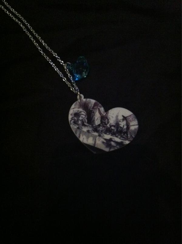 WideEyedDesigns's tweet photo. Alice in Wonderland; mad hatters tea party pendant with blue faceted teapot charm. Curiouser and curiouser! http://t.co/q2tnTckL